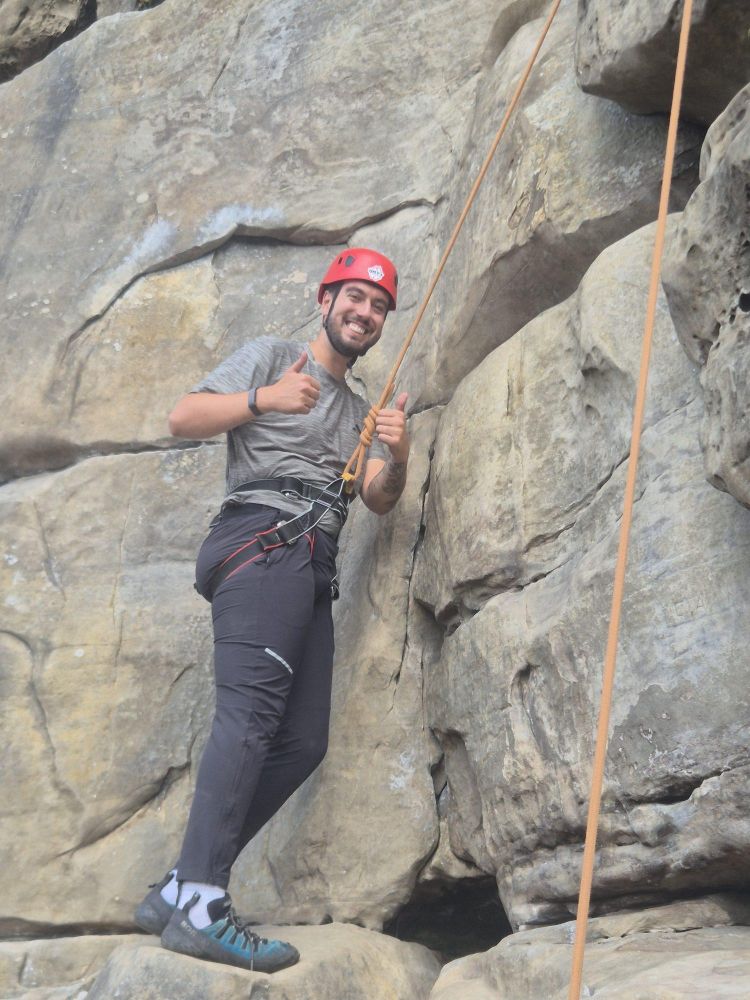 man giving thumbs up on rock climbing experience in sussex and kent
