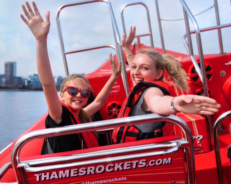 two happy passengers a thames rockets ultimate speedboat experience on the thames in london