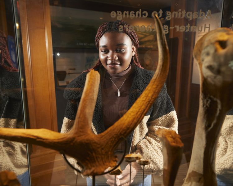 woman looking at the exhibits at sea city museum in southampton