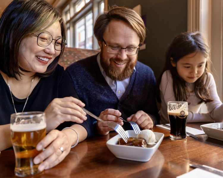 people eating in pub on food tour through london's chinatown and soho