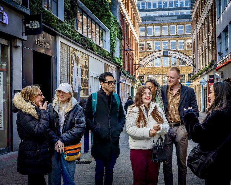 group on carnaby street on food tour through london's chinatown and soho