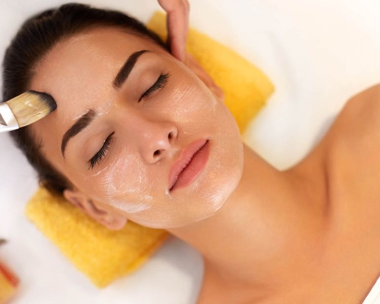 woman having face mask applied during facial on a bannatyne spa day
