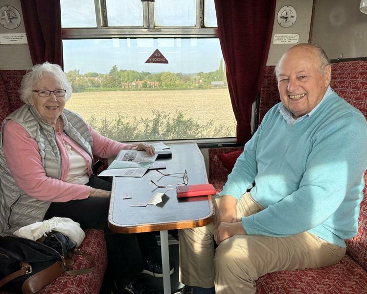 Couple on steam train