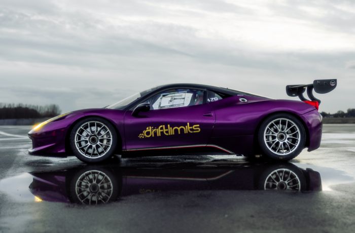 ferrari 458 on the track as part of a ferrari 458 challenge vs lamborghini or mclaren driving experience