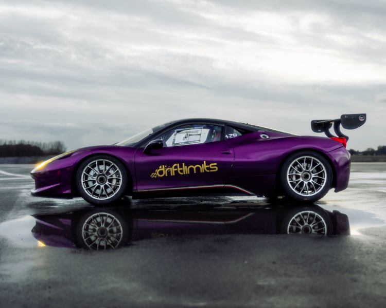 ferrari 458 on the track as part of a ferrari 458 challenge vs lamborghini or mclaren driving experience