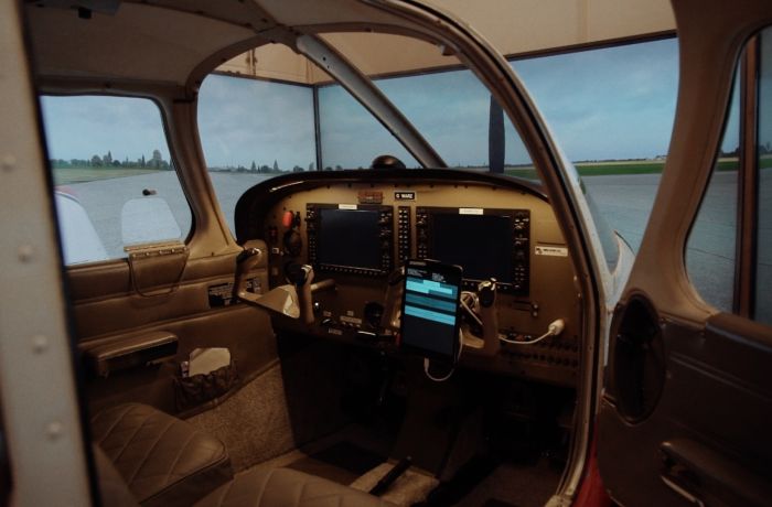 the inside of a helicopter flight simulator at deeside flight simulators