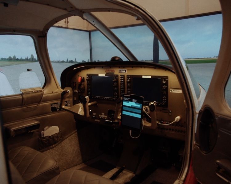 the inside of a helicopter flight simulator at deeside flight simulators