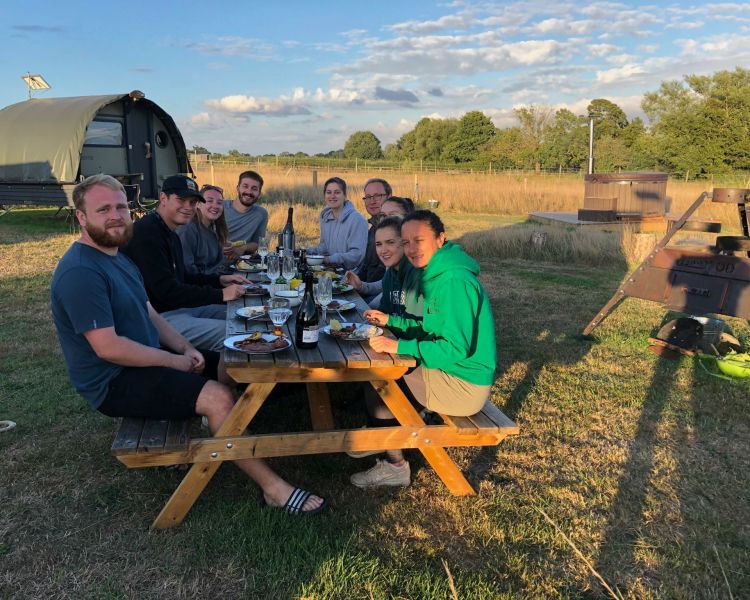 picnic table at rye bank adventure full of people