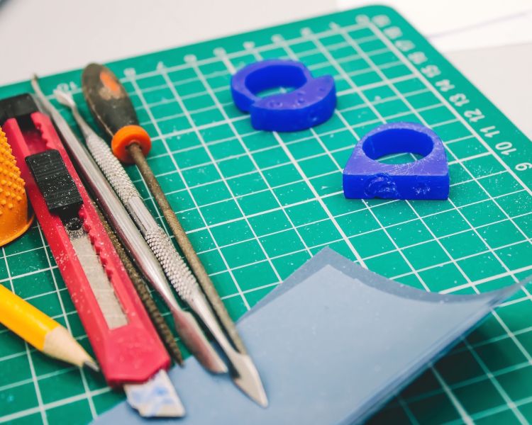 close up of the tools and wax templates used on a gemstone jewellery making workshop with stööki