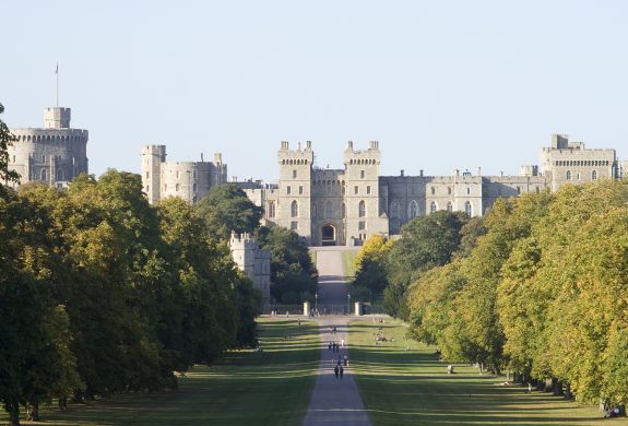 windsor castle with trees and gardens in front