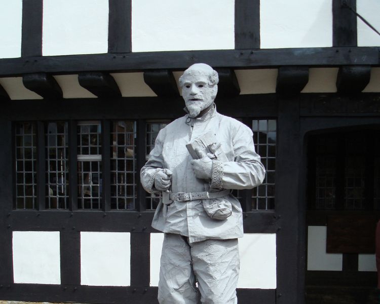 a statue of shakespeare in stratford upon avon