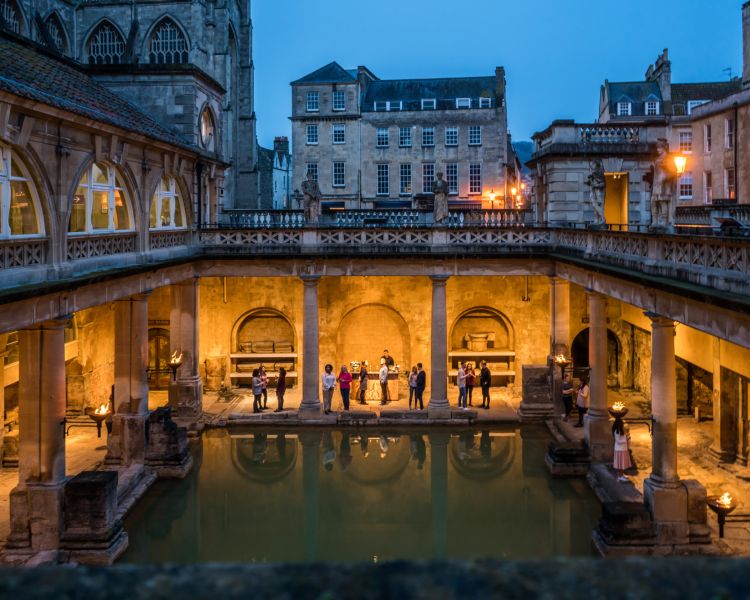 the roman baths in bath at dusk