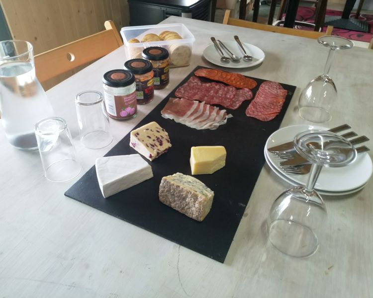 a charcuterie board set up for a wine tasting experience in kent