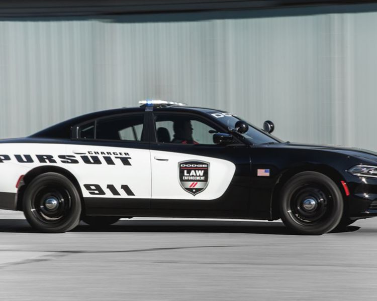 an american police car of the kind used in a police car driving experience