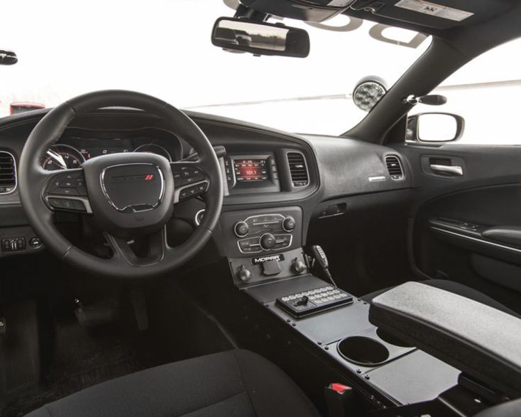 the inside of an american police car used for a police driving experience