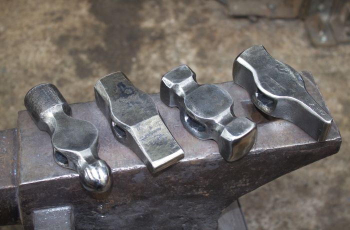 examples of hammer heads made on a hammer making blacksmith experience