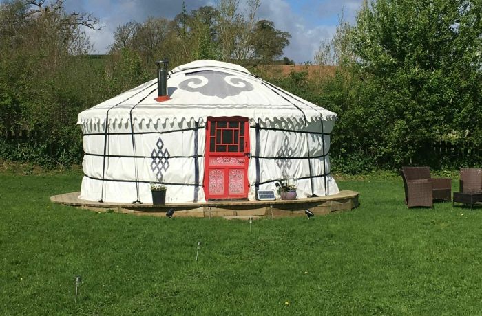 one of the devon yurts in a  field