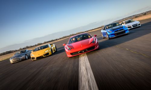 five supercars on a race track at car chase heroes driving experience day