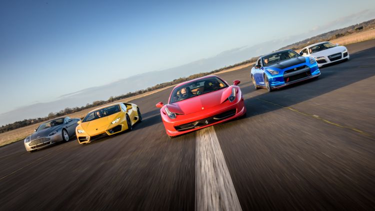 five supercars on a race track at car chase heroes driving experience day