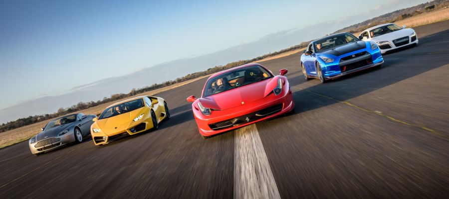 five supercars on a race track at car chase heroes driving experience day