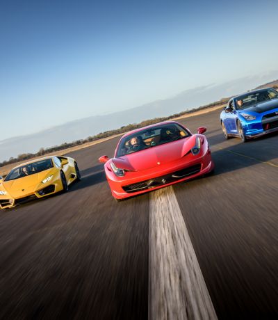 five supercars on a race track at car chase heroes driving experience day