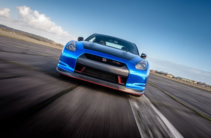 blue supercar on a race track at car chase heroes driving experience day