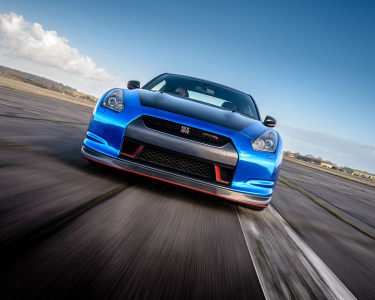 blue supercar on a race track at car chase heroes driving experience day