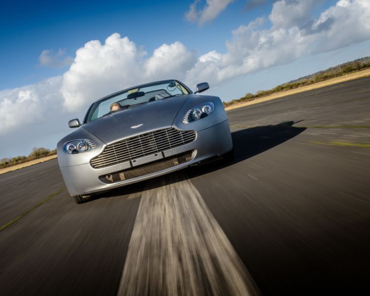 silver supercar on a race track at car chase heroes driving experience day