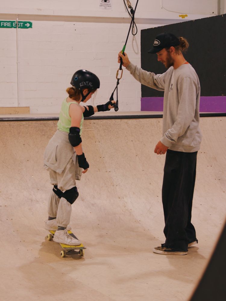 young child on a skateboard lesson experience day