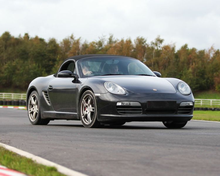 a porsche on a race track as part of a driving experience day