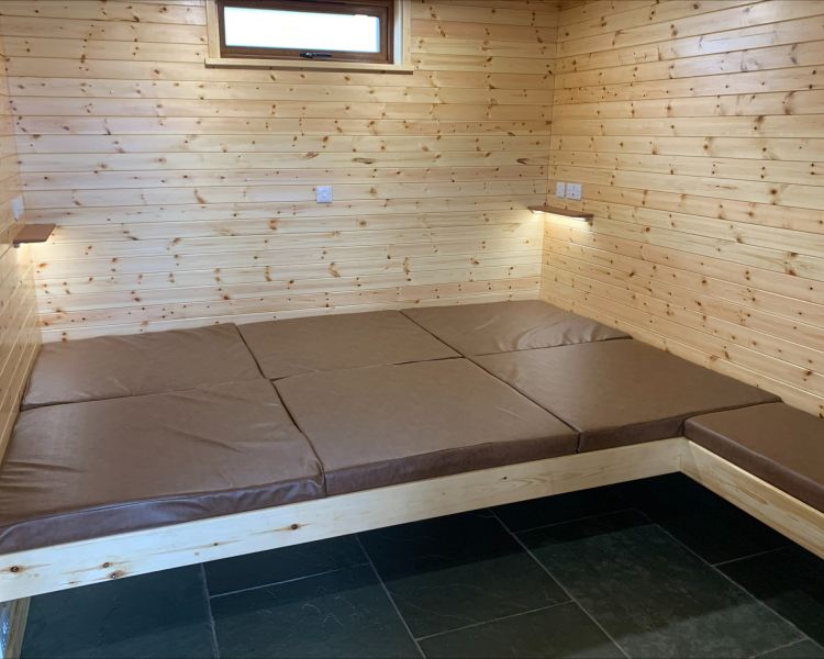 the sleeping area in the glamping hut in the lake district