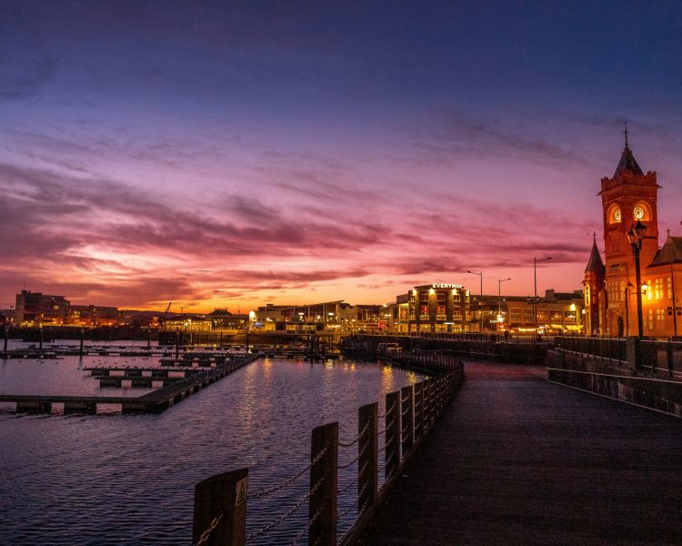 Cardiff bay at dusk the pierhead building and national assembly for wales can be seen over the water