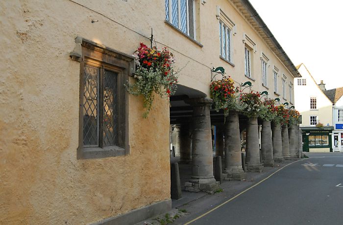Old stone cottages line the chipping steps in tetbury in the cotswolds
