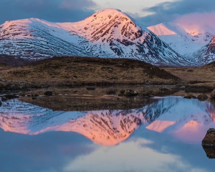 The mountainous landscape of glencoe at sunset...