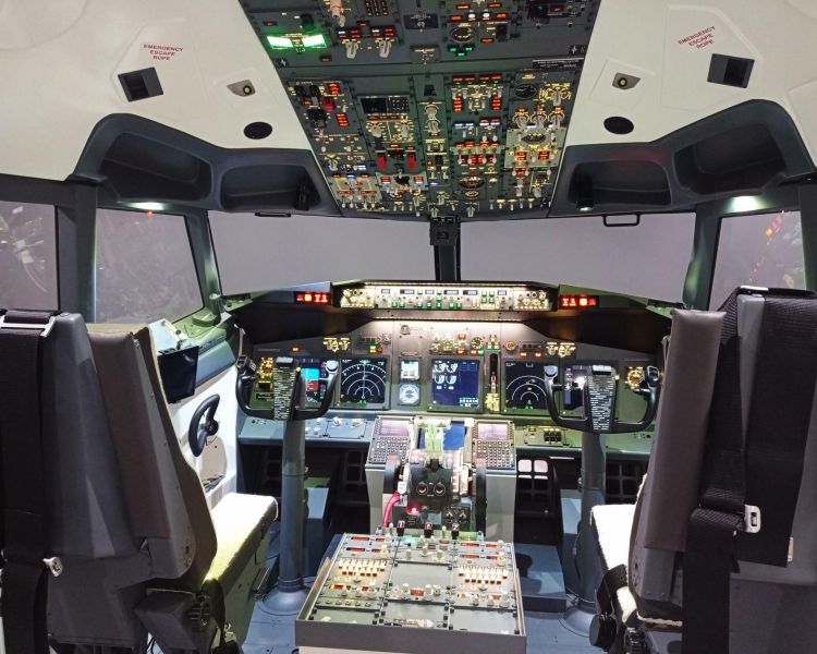 the cockpit of a Boeing 737 - 800NG ready for a flight simulator experience