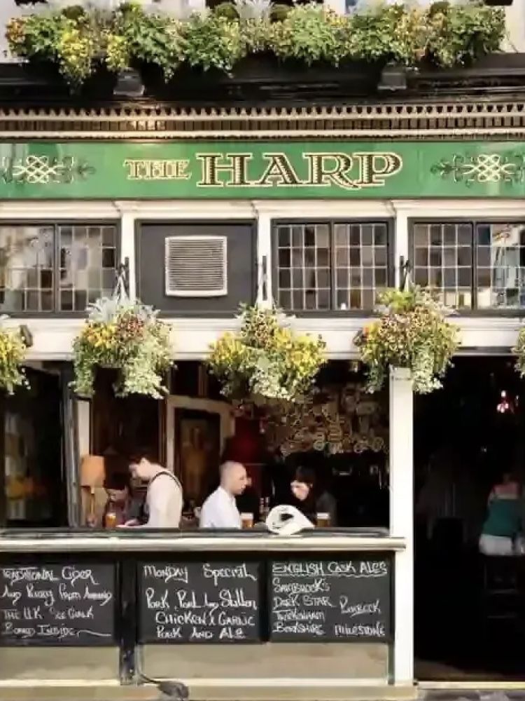 the front of the harp pub in london seen on a secret london pub walking tour