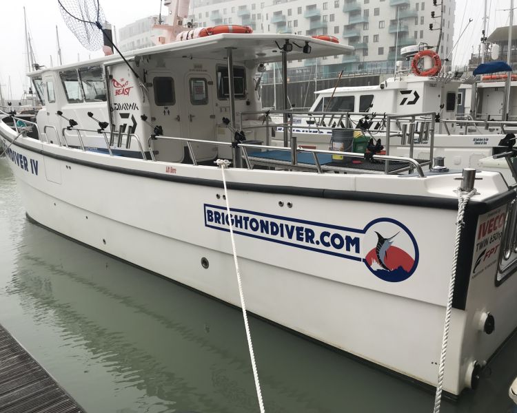 a fishing boat in brighton marina