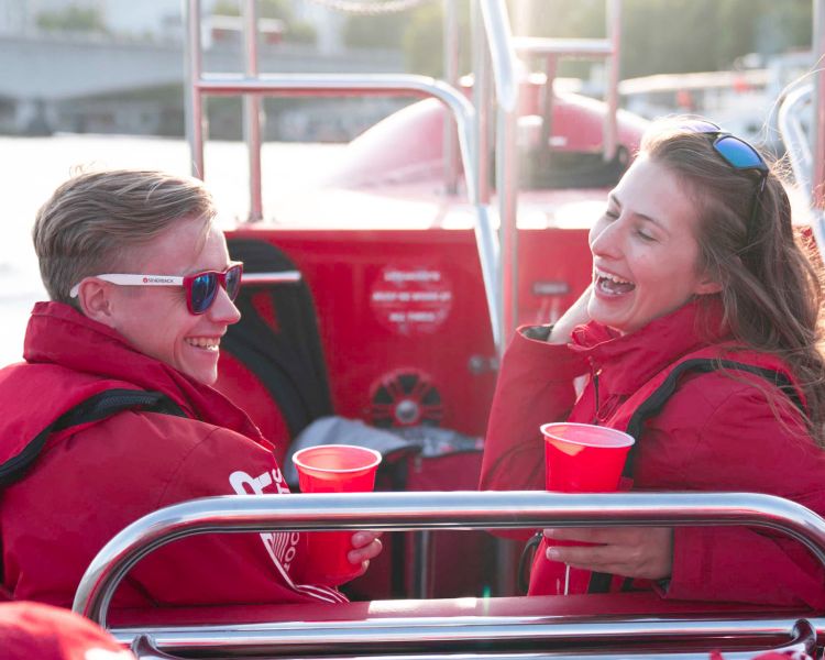 passengers enjoying a thames rocket speedboat experience in london