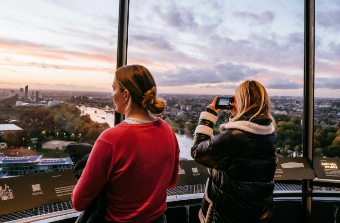 two women looking out at the london skyline from the top of lift 109