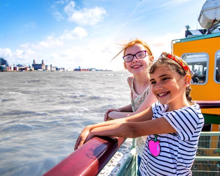 Children smiling in the Liverpool Sightseeing River Cruise