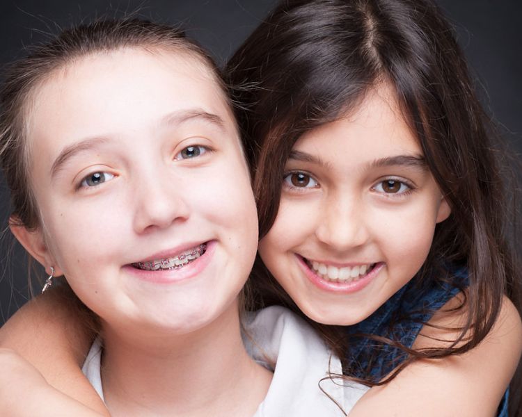 two siblings on a photoshoot
