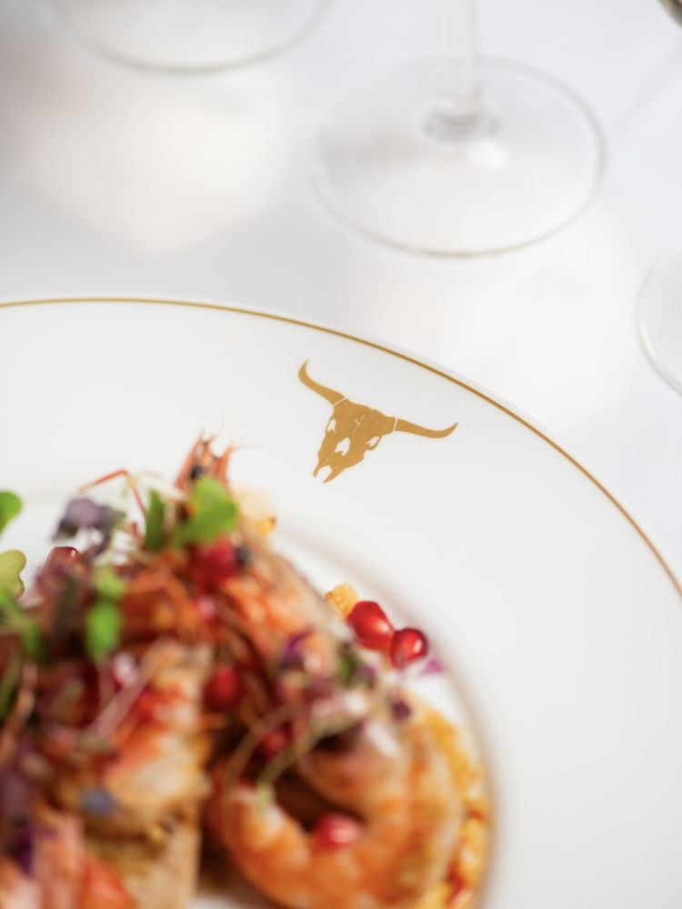 a close up of a prawn starter at marco pierre white's london steakhouse company