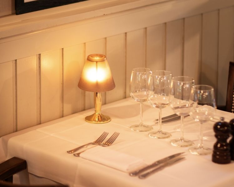 a table set up ready for diners at marco pierre white's london steakhouse company