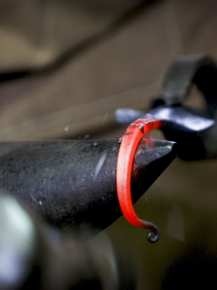 a hook being bent on a blacksmith experience