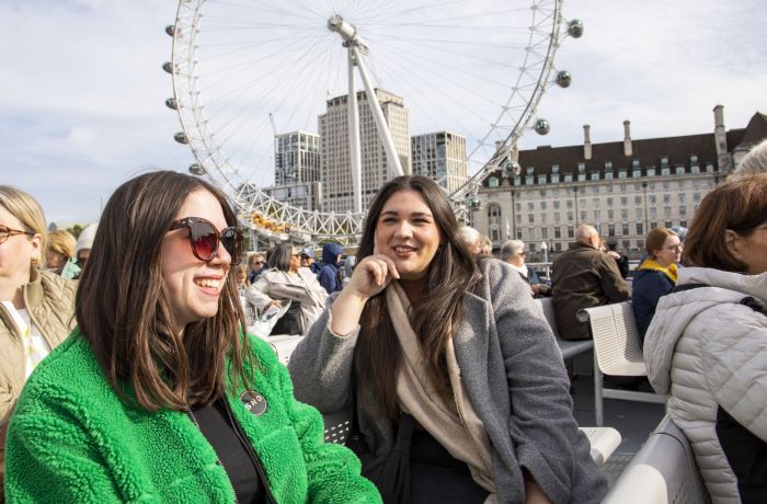 Two Guests Smiling on the London Sightseeing River Cruise