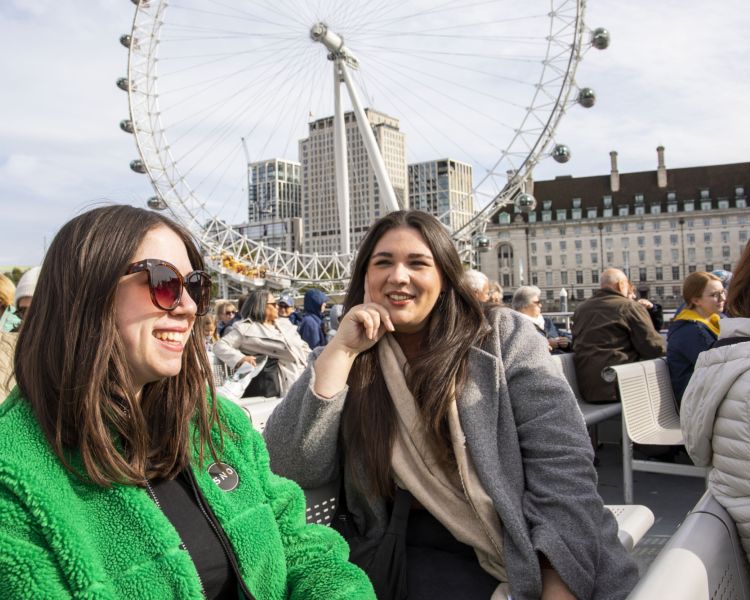 Two Guests Smiling on the London Sightseeing River Cruise