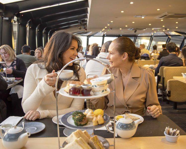 Guests on the London Sightseeing River Cruise with Afternoon Tea