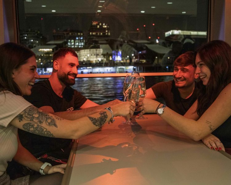 Guests Clinking Glasses on the London Sightseeing Evening River Cruise