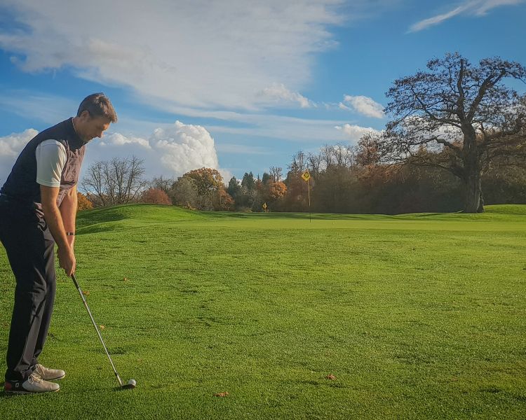 Man swinging a golf club