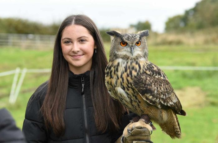 Lady holding an owl